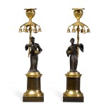 A pair of Regency ormolu-mounted patinated bronze chinoiserie figural candlesticks , circa 1810