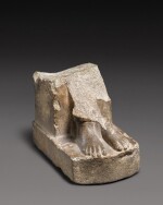 An Egyptian Basalt Statue Fragment, Late Period, 712-30 B.C., or earlier