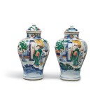 A pair of wucai 'figural' jars and covers, Qing dynasty, Shunzhi / Kangxi period | 清順治 / 康熙 五彩人物故事圖蓋罐一對