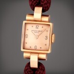 A pink gold bracelet watch | Circa 1944
