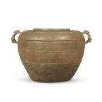 An ash-glazed handled jar, Eastern Zhou dynasty, Warring States period | 東周 戰國 青釉繩紋雙繫罐