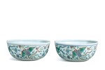A pair of doucai 'dragon and phoenix' cups, Qing dynasty, early 18th century