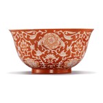 A CORAL-RED RESERVE-DECORATED 'FLORAL' BOWL,  QIANLONG SEAL MARK AND PERIOD