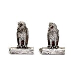 A pair of Victorian silver owl pepperettes , George Heath & Co., London, 1891