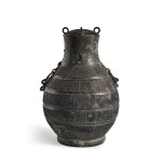 An archaic bronze wine vessel and cover (Hu), Eastern Zhou dynasty, Warring States period | 東周 戰國 青銅交龍紋牛首耳蓋壺