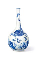 A blue and white 'carp and dragon' bottle vase, Qing dynasty, Kangxi period | 清康熙 青花鯉躍龍門長頸瓶