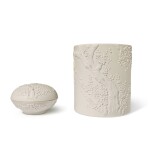 A carved white biscuit 'prunus' brushpot and seal paste box and cover, Qing dynasty, 19th century | 清十九世紀 素胎雕瓷梅花紋筆筒及圓蓋盒 
