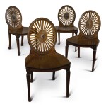 A SET OF FOUR GEORGE III MAHOGANY WHEEL-BACK HALL CHAIRS, LATE 18TH CENTURY