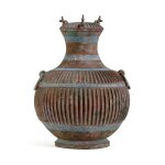 An unusual azurite-painted bronze ribbed vessel and cover, hu, Eastern Zhou dynasty | 東周 青銅嵌石青豎棱蓋壺