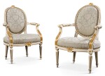 A PAIR OF GEORGE III PARCEL-GILT PAINTED OPEN ARMCHAIRS, LATE 18TH CENTURY