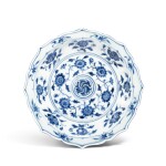 A small blue and white 'floral' barbed dish, Ming dynasty, Yongle period | 明永樂 青花花卉紋菱花式小盤