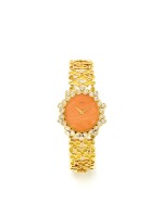 Lot 170 PIAGET | A YELLOW GOLD AND DIAMOND SET BRACELET WATCH WITH CORAL DIAL CIRCA 1975
