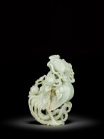 A large celadon jade 'phoenix and peony' group, Qing dynasty, 18th century | 清十八世紀 青白玉雕鳳凰牡丹紋擺件