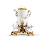 A gilt-bronze and silver-gilt mounted Chinese Blanc de Chine porcelain fountain, the porcelain Kangxi (1662-1722), the mounts early Louis XV, circa 1735