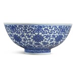 A large blue and white Ming-style 'eight Buddhist emblems' bowl, Qianlong seal mark and period | 清乾隆 青花纏枝蓮八吉祥紋大盌  《大清乾隆年製》款