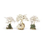 A SET OF THREE ENGLISH SILVER-GILT AND HARDSTONE TREES, MAKER'S MARK FB, LONDON, 1972 (2) AND 1975 (1)