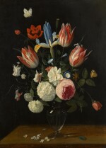A still life of spring flowers in a glass vase on a table | 《靜物：桌上玻璃瓶中的春日花卉》