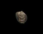 A FRAGMENTARY EGYPTIAN GRANITE HEAD OF A KING OR GOD, 18TH DYNASTY, TUTHMOSIDE, CIRCA 1480-1390 B.C.