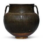 A black-glazed 'ribbed' handled jar, Northern Song / Jin dynasty | 北宋 / 金 黑釉棱線紋雙繫罐
