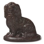 AN ENGLISH BROWN-GLAZED STONEWARE MODEL OF A SEATED SPANIEL, 19TH CENTURY