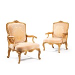 A pair of George III giltwood armchairs, circa 1765, in the manner of Matthias Lock