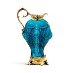 A gilt-bronze mounted blue enameled porcelain "double carp" ewer, China, 19th century and Louis XV style, late 19th century | Aiguière "aux deux carpes" en porcelaine émaillée bleu turquose, Chine, XIXe siècle et monture de bronze doré de style Louis XV, fin XIXe siècle