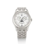 PATEK PHILIPPE  |  REFERENCE 5036,  A WHITE GOLD ANNUAL CALENDAR BRACELET WATCH WITH MOON PHASES AND POWER RESERVE INDICATION, CIRCA 1998