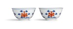 A fine pair of underglaze-blue and iron-red 'lotus' cups Seal marks and period of Qianlong | 清乾隆 青花礬紅折枝番蓮紋盃一對 《大清乾隆年製》款