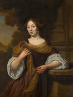 Portrait of a lady, standing three-quarter length, in a landscape