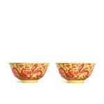 A very rare pair of yellow-ground iron-red decorated 'dragon' bowls, Seal marks and period of Qianlong | 清乾隆 黃地礬紅五龍圖盌一對 《大清乾隆年製》款