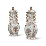 A Pair of Chinese Export Famille-Rose Baluster Vases and Covers, Qing Dynasty, Qianlong Period, Circa 1785 | 清乾隆 約1785年 粉彩松鼠葡萄浮雕花籃圖龍耳蓋瓶一對