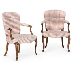 A pair of George III carved mahogany armchairs, circa 1775, in the manner of John Cobb
