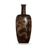 A fine and rare gilt-decorated black-ground 'dragon' vase, Qing dynasty, Kangxi period  清康熙 黑地描金龍紋瓶