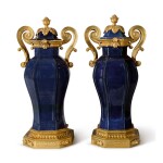 A PAIR OF LOUIS XVI GILT BRONZE-MOUNTED BLUE GLAZE OCTAGONAL COVERED VASES, THE PORCELAIN QING DYNASTY, 18TH CENTURY, THE MOUNTS CIRCA 1770 AND MID-19TH CENTURY