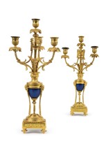  A PAIR OF LOUIS XVI STYLE GILT BRONZE AND BLUED STEEL FOUR-LIGHT CANDELABRA