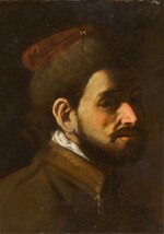 Portrait of a man in a fur cap