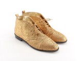 Pair of gold embroidered fabric and leather ankle boots