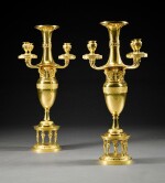 A pair of Russian neoclassical gilt-bronze four-light candelabra, circa 1800