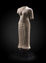 A grey sandstone torso of a female divinity Khmer art, Baphuon style, circa 11th Century | 高棉藝術 約十一世紀 巴普昂式砂岩雕女神立像殘件