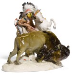 A MEISSEN ALLEGORICAL GROUP OF A BRAVE AND BISON, EMBLEMATIC OF THE AMERICAS FROM A SET OF THE CONTINENTS, CIRCA 1906