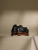 An inscribed Lingbi scholar's rock, The Lingbi: Possibly Song/Yuan Dynasty, The Yumu stand: Qing Dynasty, 18th/19th Century |  明以前，或爲宋元 海上三山靈璧石供  木座為十八/十九世紀