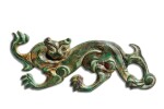 An exceptional and rare gilt-bronze 'feline' ornament, North China, 1st - 2nd century AD |  公元一至二世紀 中國北方 鎏金銅獸形飾