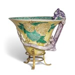 A famille-verte biscuit 'chilong' cup, Qing dynasty, Kangxi period | 清康熙 素三彩壽字螭龍紋奈何盃