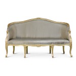 A George III giltwood and upholstered settee, circa 1775