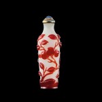 A ruby-red overlay glass 'peach and chime' snuff bottle, Qing dynasty, 19th century | 清十九世紀 涅白地套寶石紅料慶壽鼻煙壺