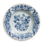 A DOCCIA BLUE AND WHITE SOUP PLATE CIRCA 1740