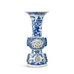 A rare blue and white reticulated gu-form vase, Ming dynasty, Wanli period | 明萬曆 青花鏤空仿古獸面紋觚