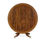 A Regency Gilt-Bronze Mounted Satinwood Inlaid Rosewood Circular Center Table, Early 19th Century