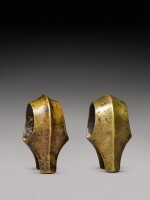 A pair of Naga cast and engraved brass bangles, India, Nagaland, 19th century
