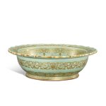 A very rare moulded and gilt and silver-decorated celadon-glazed barbed basin, Seal mark and period of Qianlong | 清乾隆 粉青釉凸花描金銀萬壽吉慶折沿菱口盆 《大清乾隆年製》款